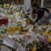 Hong Kong Remembers Fire Victims as Investigators Search for Remains