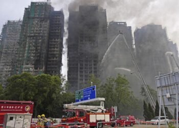Police Arrest Suspects Following Deadly Fire in Hong Kong Flats: Dozens Missing