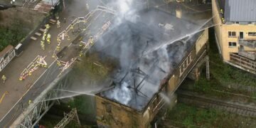Fire Near Camden Rail Tracks Causes Ongoing Travel Disruptions Across UK
