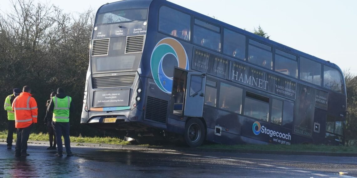 School Bus Crashes into Ditch in Kent Due to Black Ice Conditions