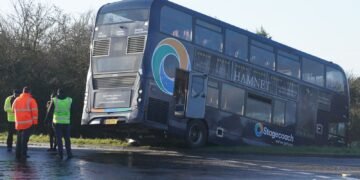 School Bus Crashes into Ditch in Kent Due to Black Ice Conditions