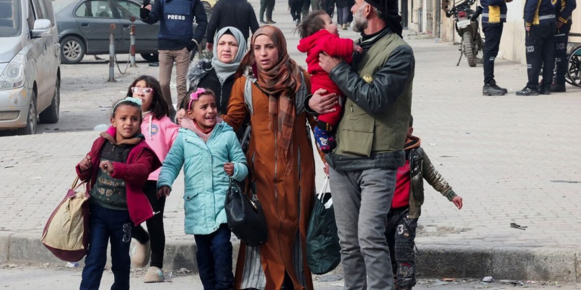 Tens of Thousands Evacuate Aleppo Amid Ongoing Conflict in Syria