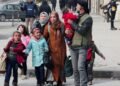 Tens of Thousands Evacuate Aleppo Amid Ongoing Conflict in Syria