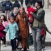 Tens of Thousands Evacuate Aleppo Amid Ongoing Conflict in Syria