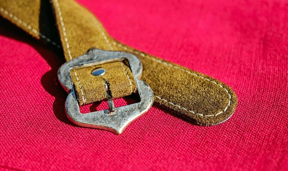 role of accessories like scarves and belts