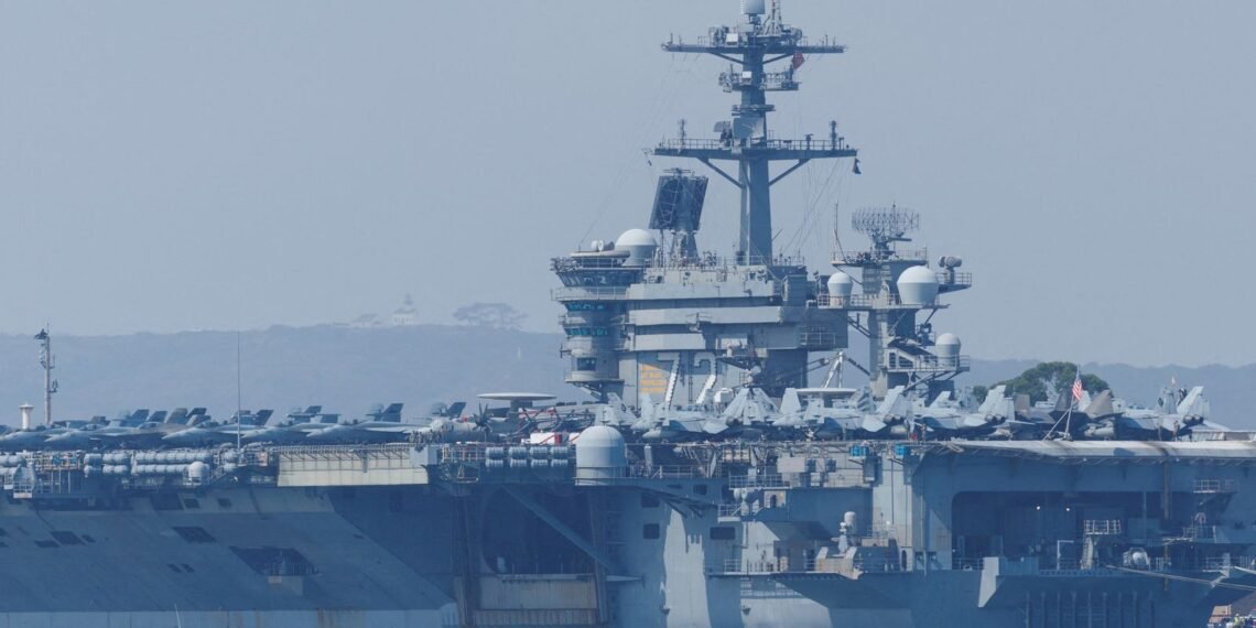 US Aircraft Carrier Responds to 'Aggressive' Iranian Drone Amid Rising Tensions