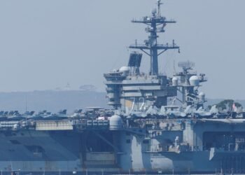 US Aircraft Carrier Responds to 'Aggressive' Iranian Drone Amid Rising Tensions